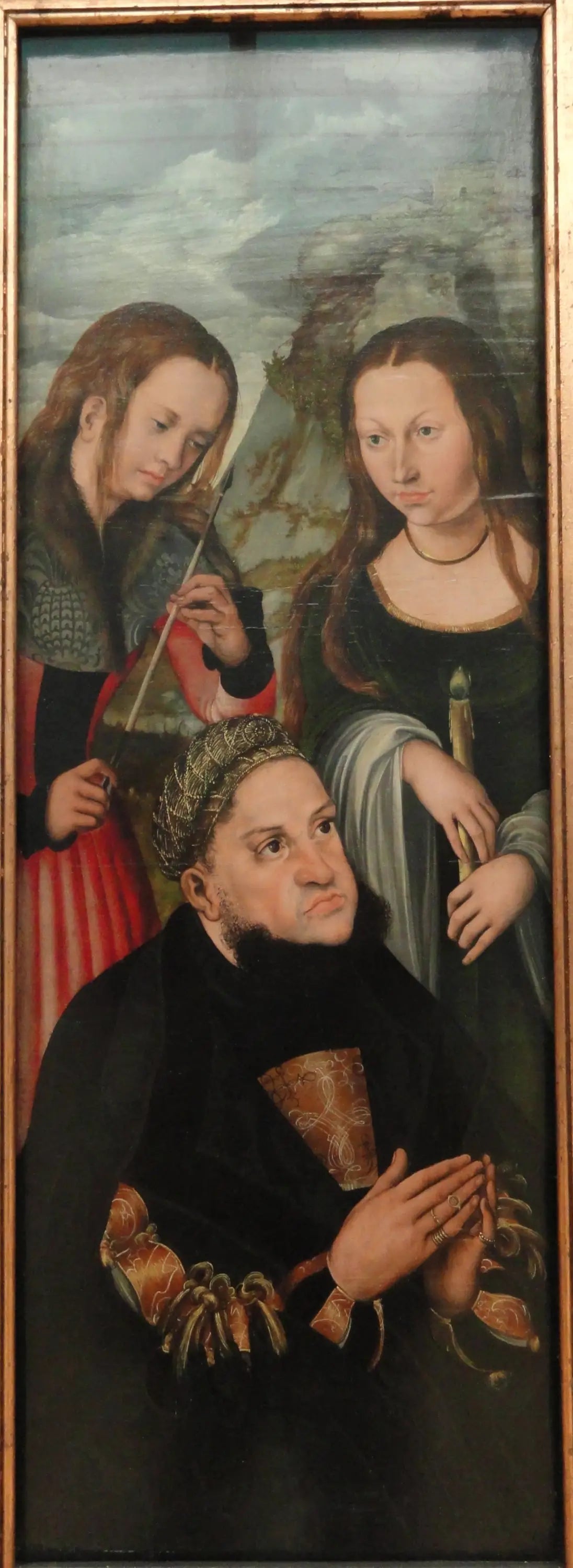 L’électeur Frédéric le Sage de Saxe (1463-1525) avec les saintes Ursule (à gauche) et Geneviève (à droite) - Lucas