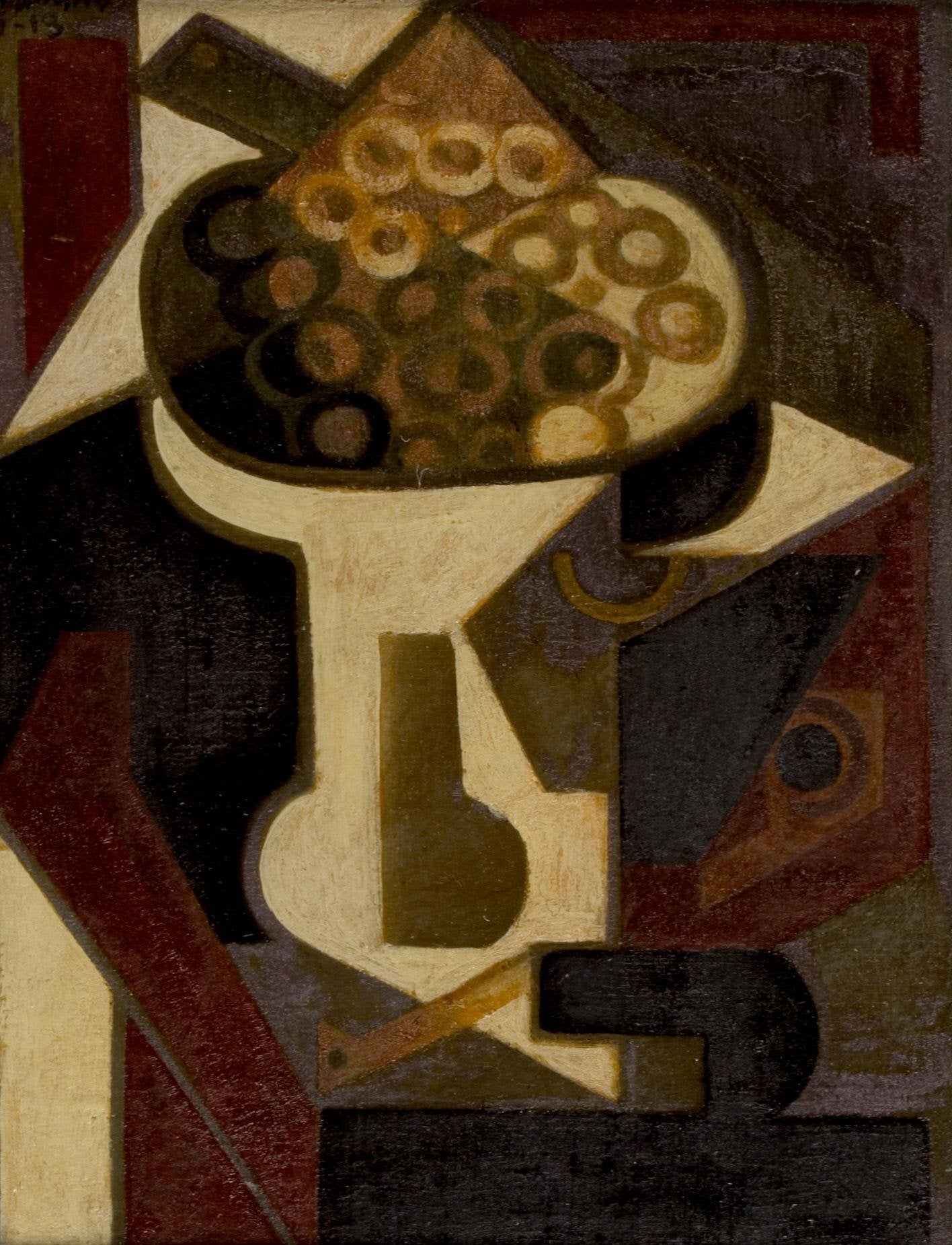 Un plat de raisins et une pipe sur une table - Juan Gris