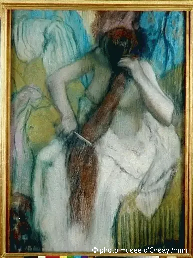 Kobieta czesząca się - Edgar Degas